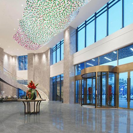 Park Inn By Radisson Nanchong Yilong Star City Plaza Екстериор снимка