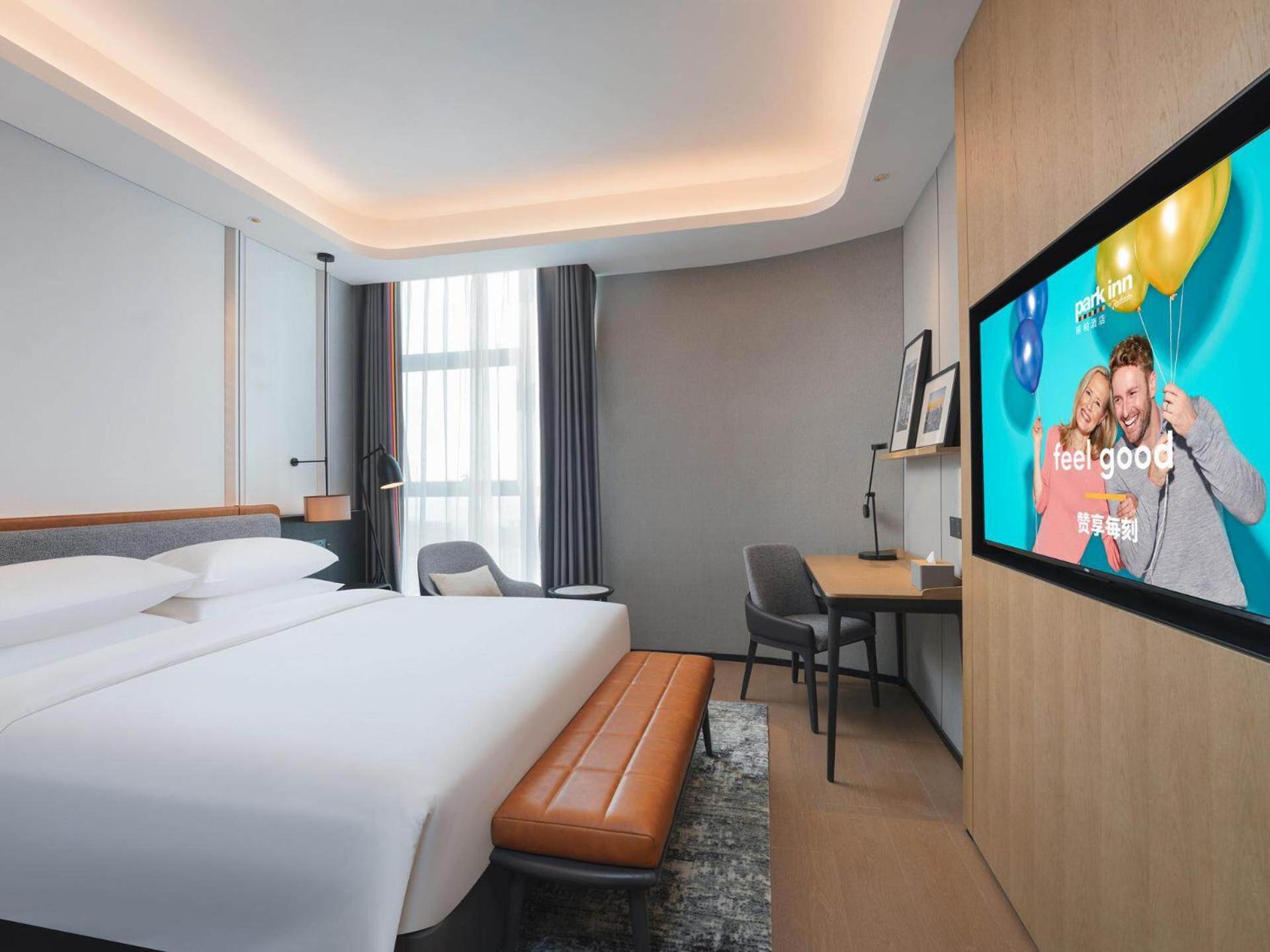 Park Inn By Radisson Nanchong Yilong Star City Plaza Екстериор снимка