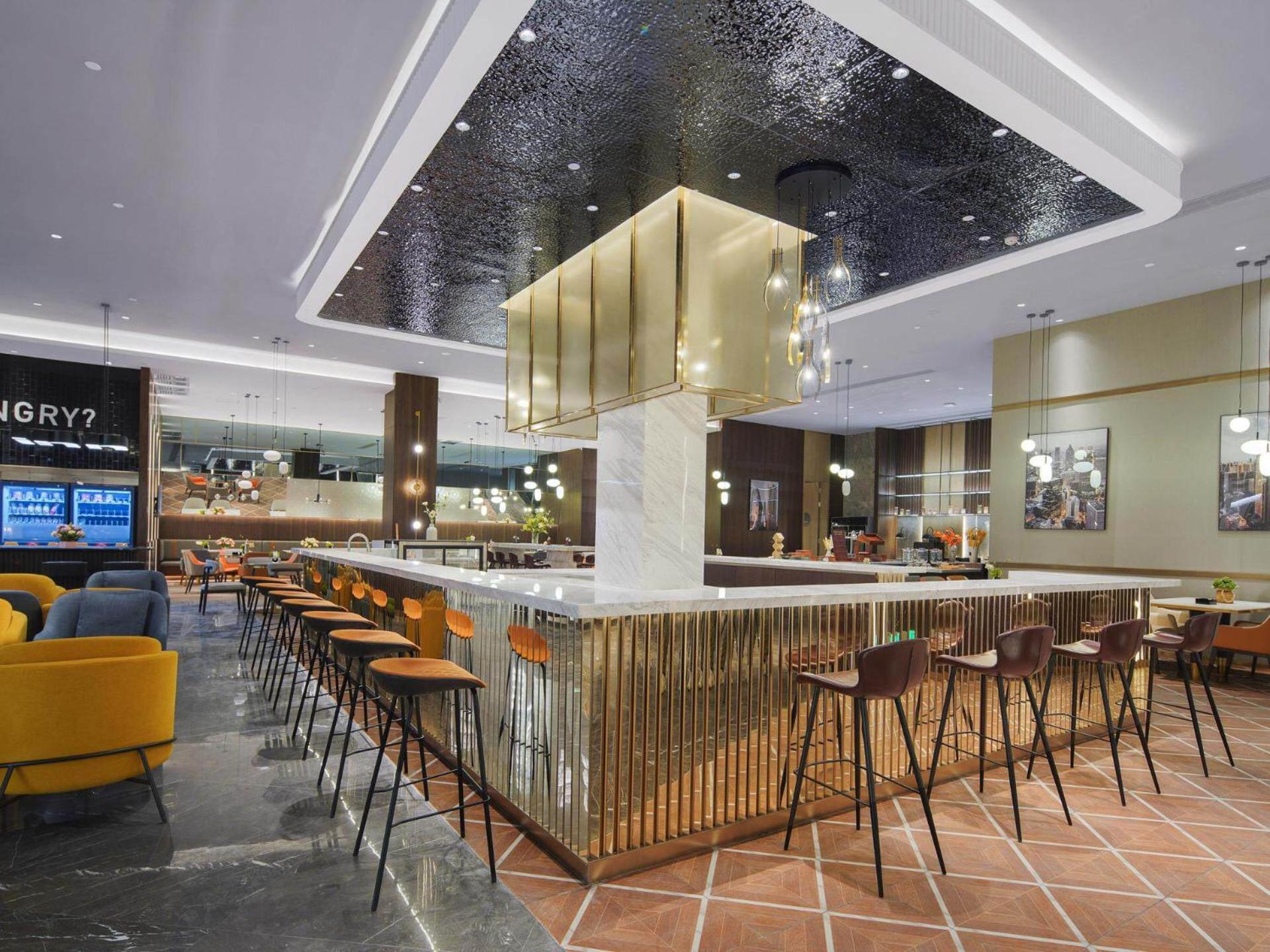 Park Inn By Radisson Nanchong Yilong Star City Plaza Екстериор снимка