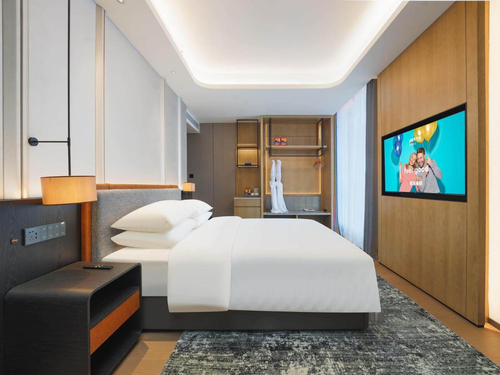 Park Inn By Radisson Nanchong Yilong Star City Plaza Екстериор снимка