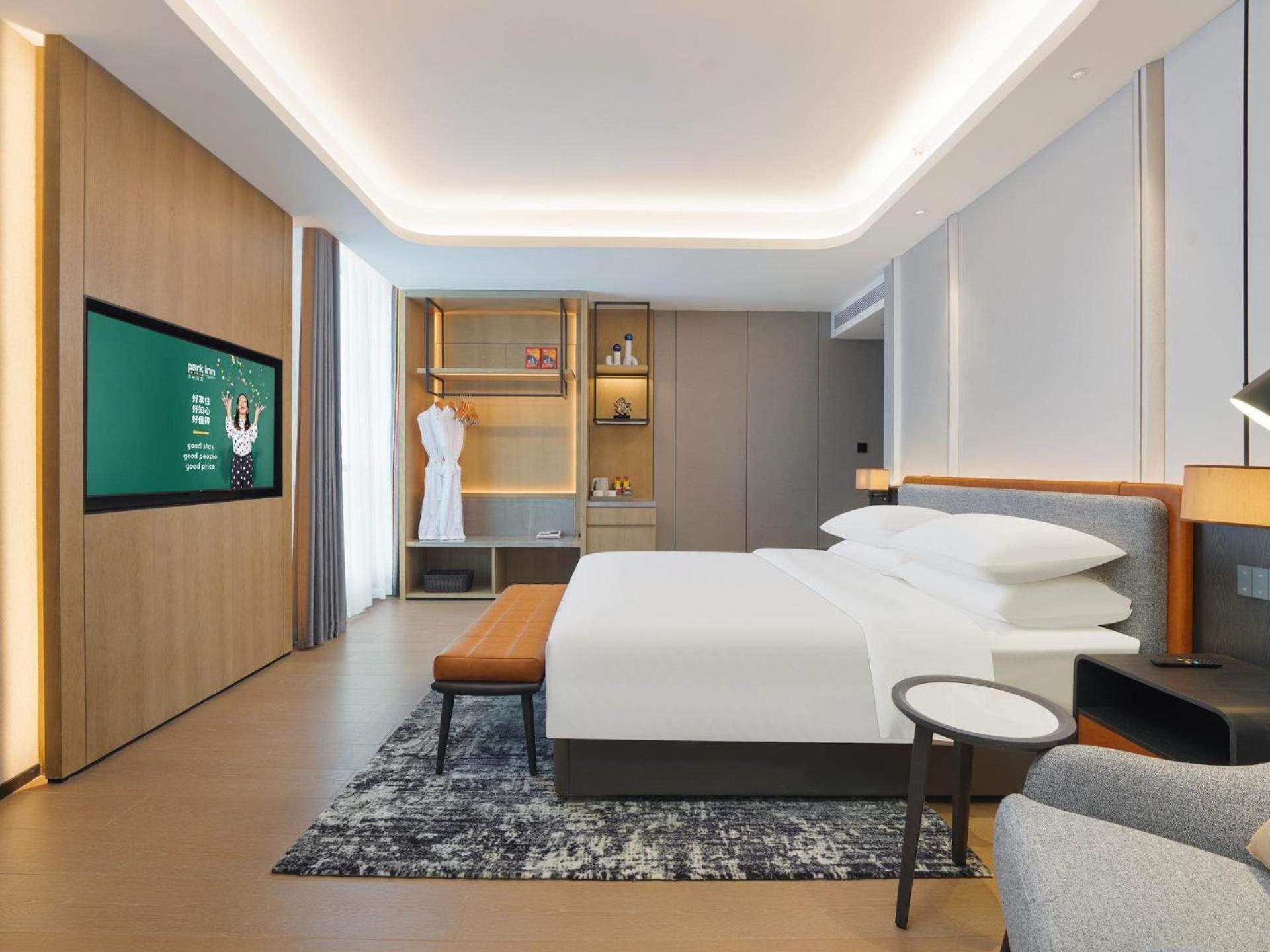 Park Inn By Radisson Nanchong Yilong Star City Plaza Екстериор снимка